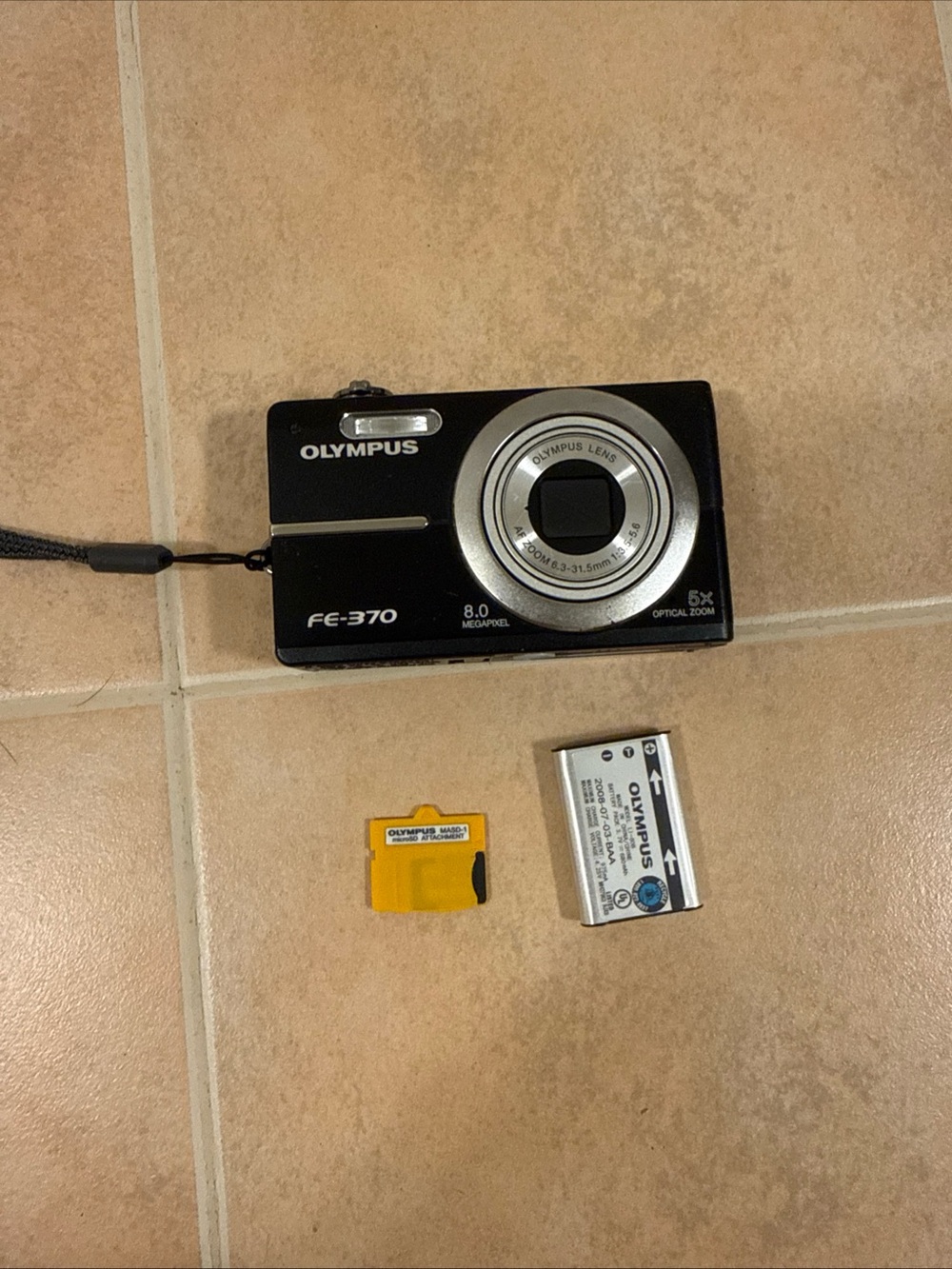 Olympus FE-370 Compact Digital Camera in Black with Silver Lens Ring